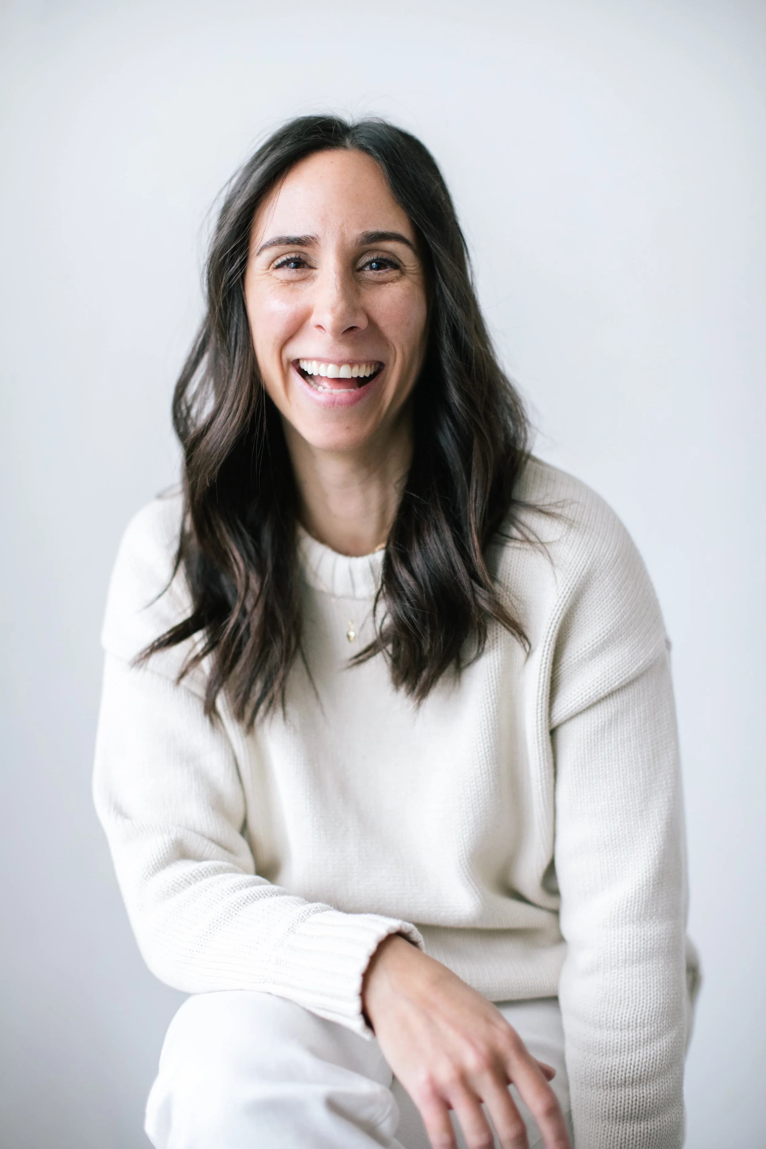 Jaclyn smiling during a Viva Counselling portrait session